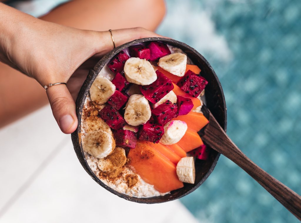 A bowl of oatmeal and fruit - an excellent source of dietary fibre. 